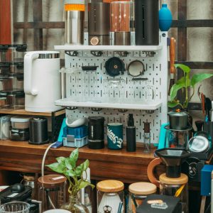 Neatly arranged coffee and kitchen equipment setup indoors, perfect for homebrewing enthusiasts.