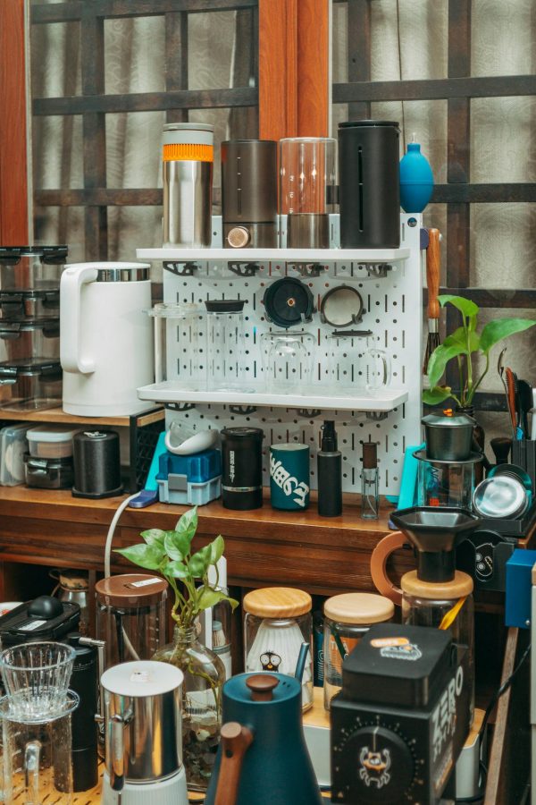 Neatly arranged coffee and kitchen equipment setup indoors, perfect for homebrewing enthusiasts.